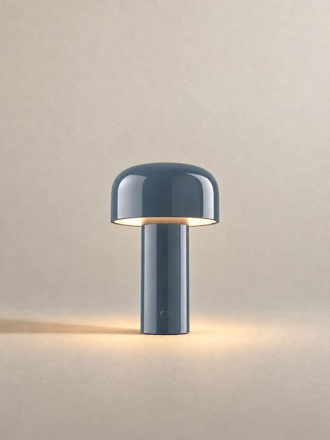 Portable dome lamp in Grey Blue, light on, warm neutral studio