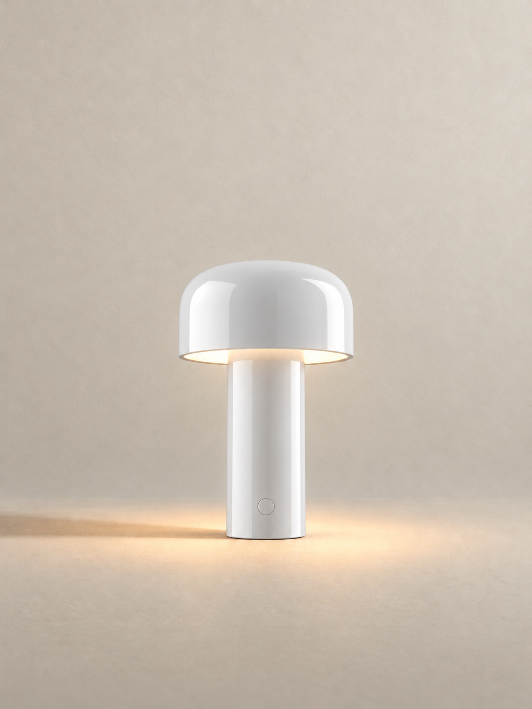 Portable dome lamp in White, light on, warm neutral studio