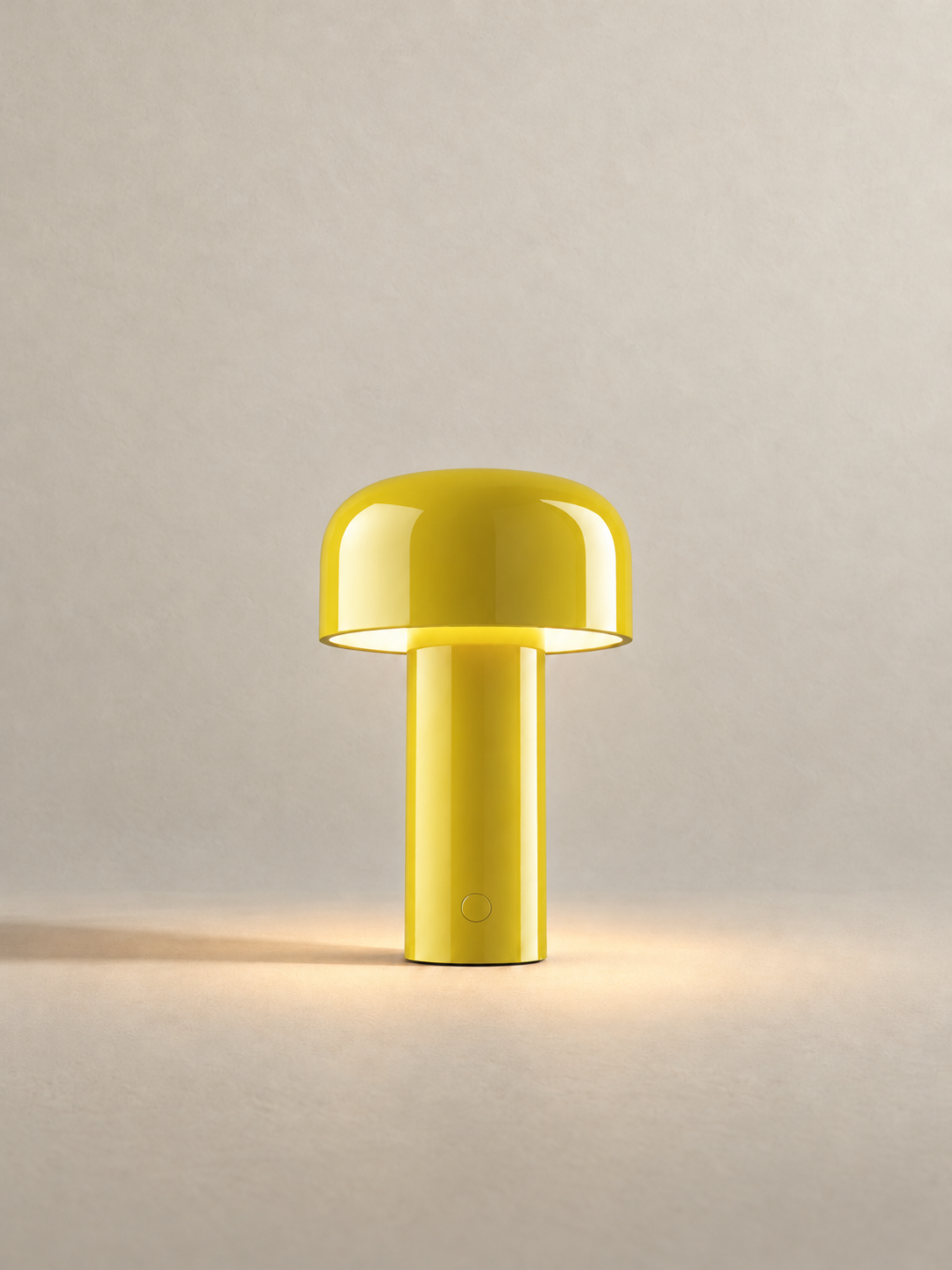 Portable dome lamp in Yellow, light on, warm neutral studio